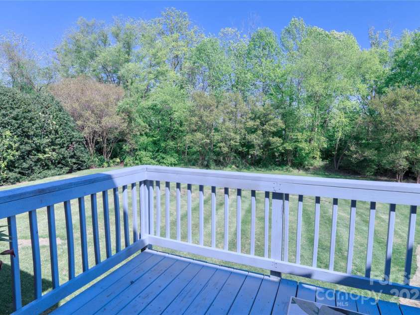143 Gibbs Road, Mooresville, NC 28117.  MLS# CAR4244508, YatesRealty ID 28148. Deck overlooking backyard