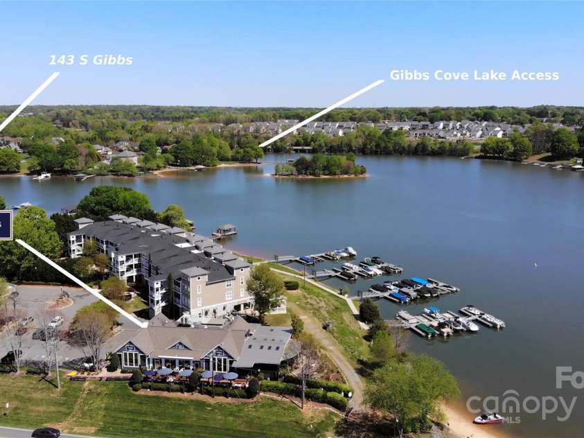 143 Gibbs Road, Mooresville, NC 28117.  MLS# CAR4244508, YatesRealty ID 28148. Drone from lake