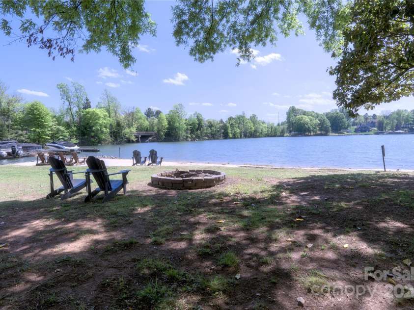 143 Gibbs Road, Mooresville, NC 28117.  MLS# CAR4244508, YatesRealty ID 28148. Lake access/firepit