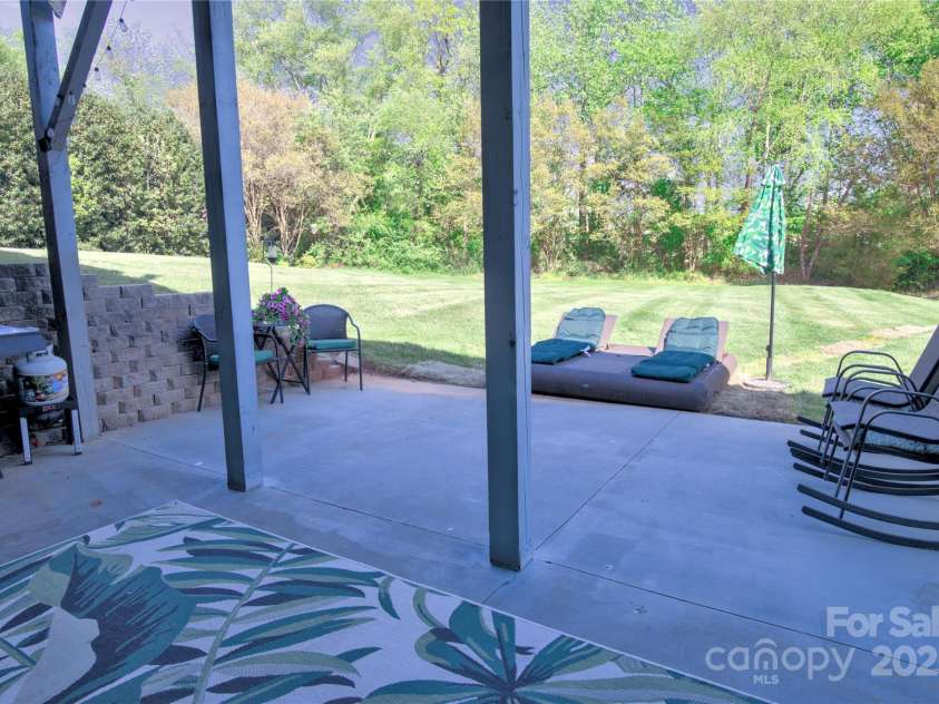 143 Gibbs Road, Mooresville, NC 28117.  MLS# CAR4244508, YatesRealty ID 28148. Patio off walk out basement