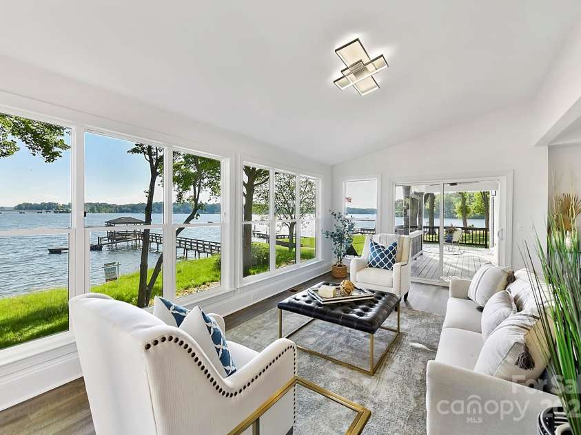 9115 Clement Circle, Terrell, NC 28682.  MLS# CAR4255076, YatesRealty ID 28149. Vaulted Living Room with plenty of natural light & perfect main channel views, through large windows!