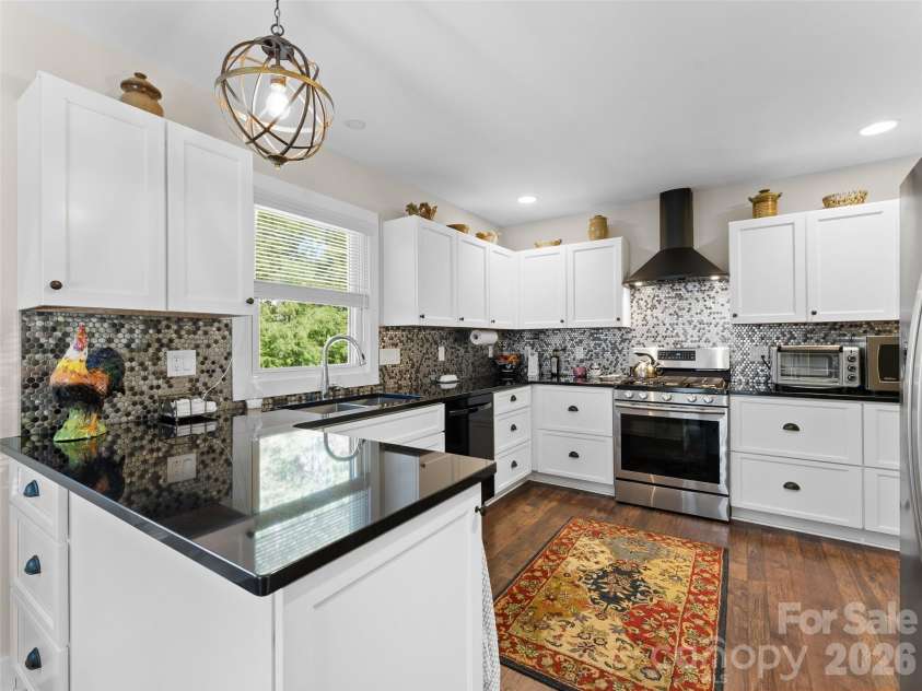 294 Caldwell Street, Brevard, NC 28712.  MLS# CAR4352392, YatesRealty ID 2815. 
