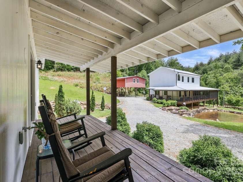 170 Penley Road, Lenoir, NC 28645.  MLS# CAR4265025, YatesRealty ID 28154. Guest House Front Porch Overlooking Main Home and Ponds