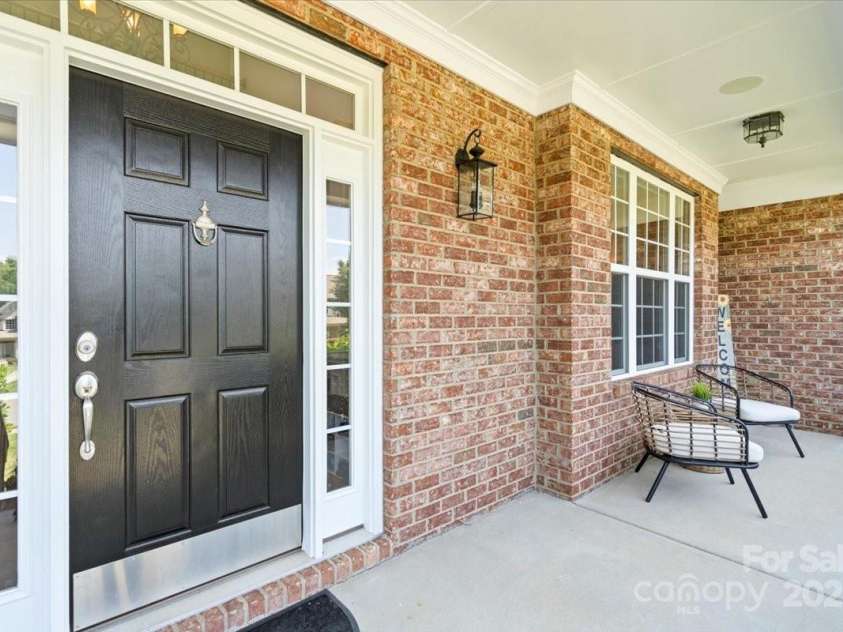 110 Isle Run Drive, Mooresville, NC 28117.  MLS# CAR4269244, YatesRealty ID 28158. Front Porch / Patio