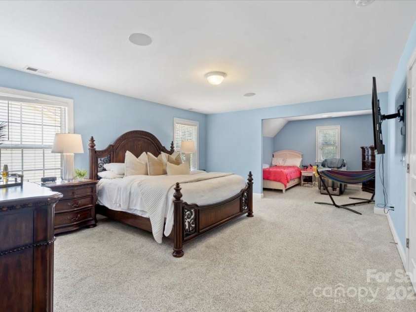 110 Isle Run Drive, Mooresville, NC 28117.  MLS# CAR4269244, YatesRealty ID 28158. Primary Bedroom w/ sitting room area