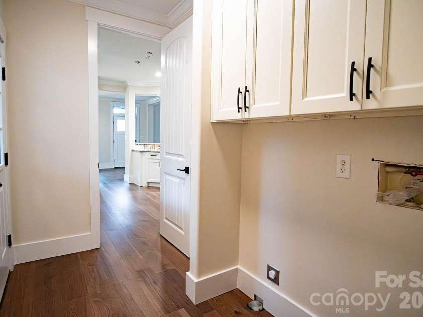 10 McMurray Lane, Black Mountain, NC 28711.  MLS# CAR4333892, YatesRealty ID 2816. Laundry looking back towards kitchen