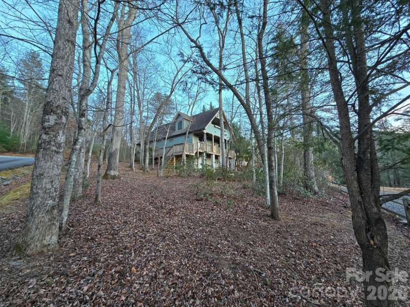 10 McMurray Lane, Black Mountain, NC 28711.  MLS# CAR4333892, YatesRealty ID 2816. Wooded lot-low maintenance