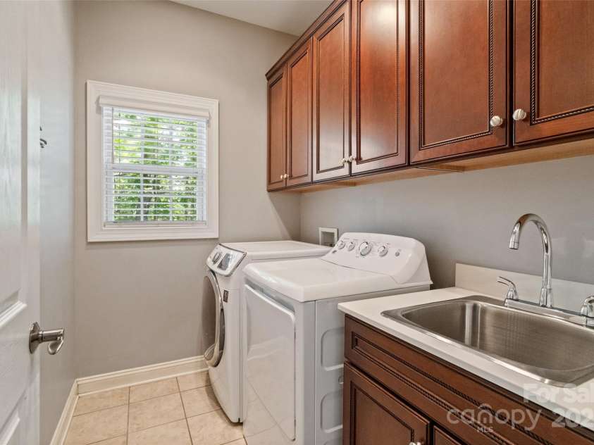 1651 Scotch Pine Lane, Tega Cay, SC 29708.  MLS# CAR4278174, YatesRealty ID 28160. Upstairs laundry room