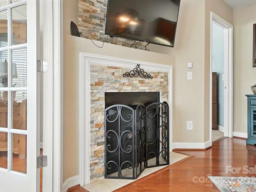 4706 Polo Gate Boulevard, Charlotte, NC 28216.  MLS# CAR4282029, YatesRealty ID 28163. Fireplace in Great Room