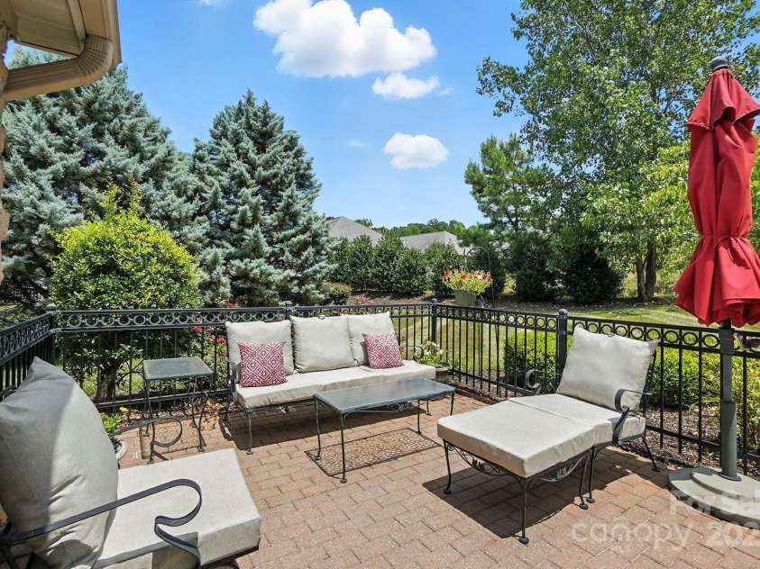 4706 Polo Gate Boulevard, Charlotte, NC 28216.  MLS# CAR4282029, YatesRealty ID 28163. Front Patio