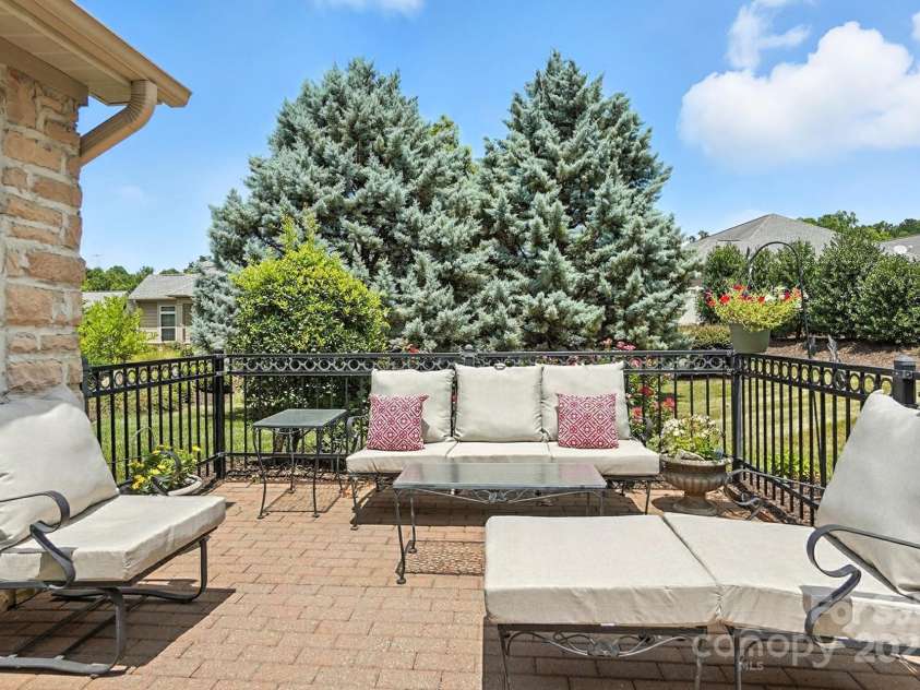 4706 Polo Gate Boulevard, Charlotte, NC 28216.  MLS# CAR4282029, YatesRealty ID 28163. Front Patio
