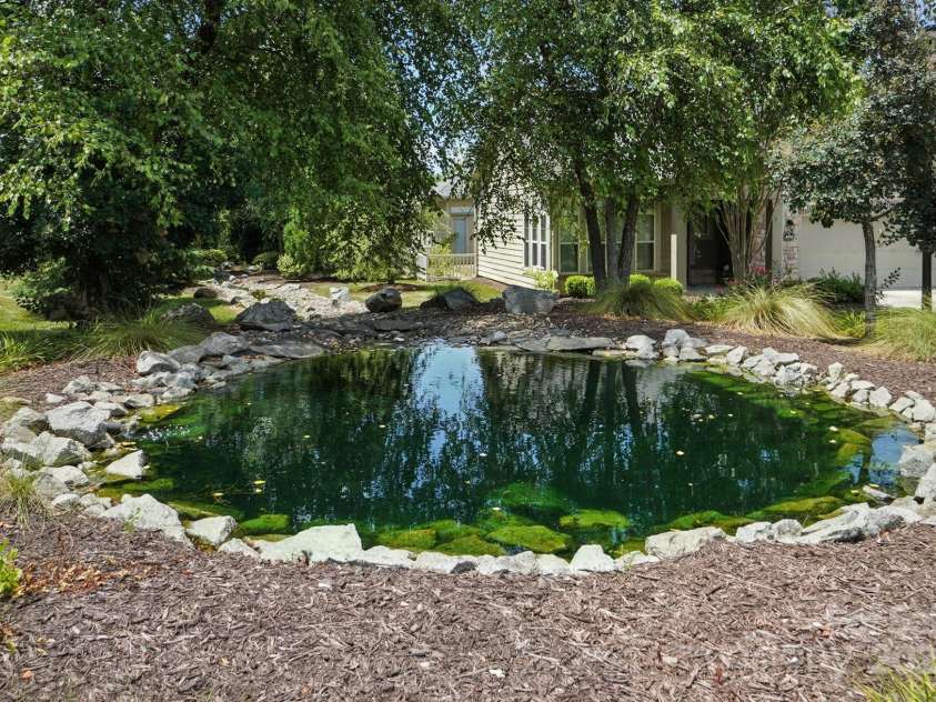 4706 Polo Gate Boulevard, Charlotte, NC 28216.  MLS# CAR4282029, YatesRealty ID 28163. Nearby pond in common area