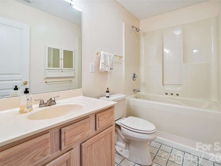 47 Barn Owl Way, Hendersonville, NC 28792.  MLS# CAR4367835, YatesRealty ID 28166. 2 bath between bed rooms 2 and 3
