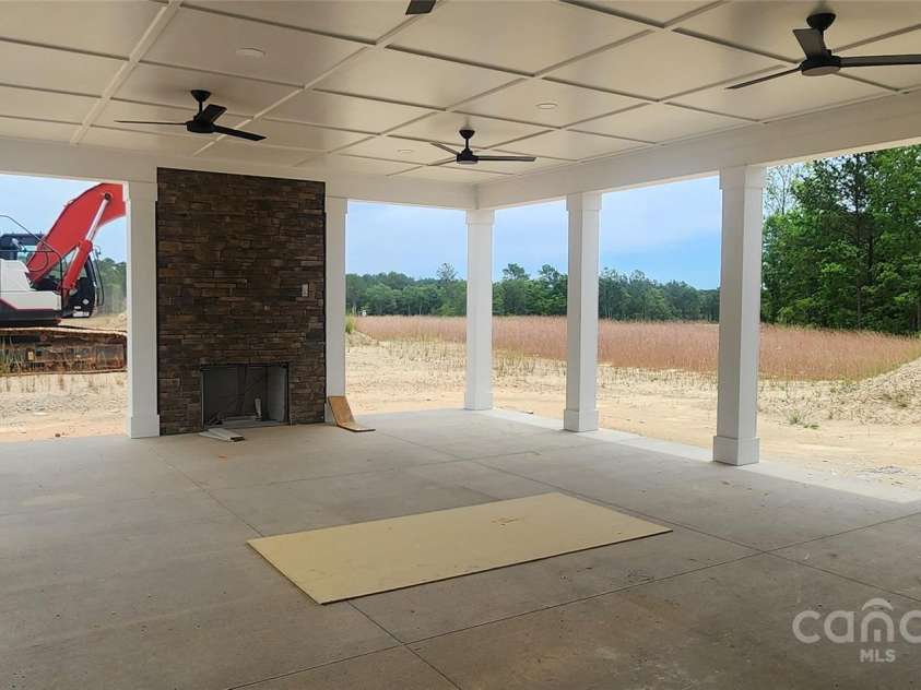 638 Amberjack Place, York, SC 29745.  MLS# CAR4276603, YatesRealty ID 28168. Cabana fireplace - Estimated completion July 2025