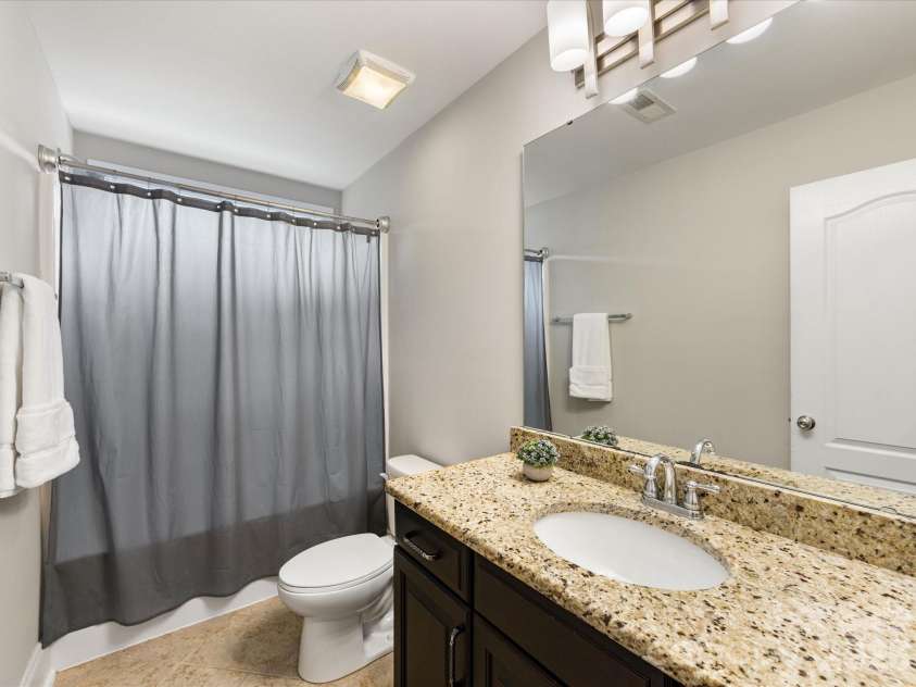 9311 Scorpio Lane, Mint Hill, NC 28227.  MLS# CAR4372655, YatesRealty ID 28169. 3rd full bath with matching vanity and granite top!