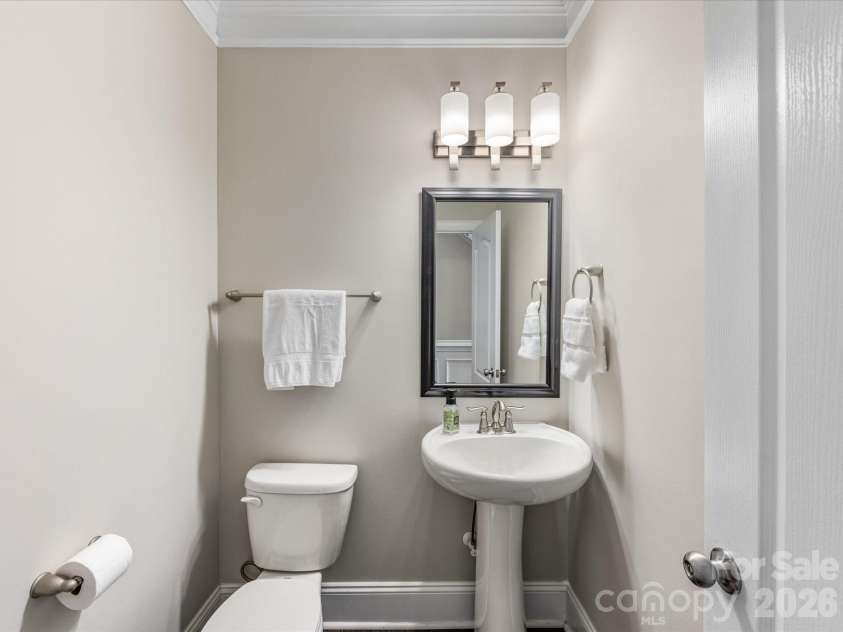 9311 Scorpio Lane, Mint Hill, NC 28227.  MLS# CAR4372655, YatesRealty ID 28169. Half bath easily accessible in the hallway on the main floor.