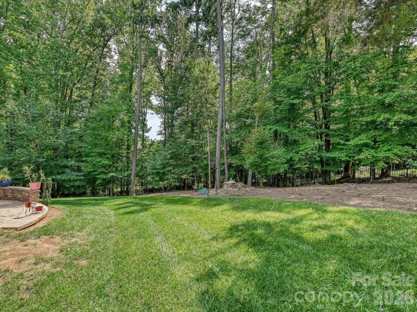 9311 Scorpio Lane, Mint Hill, NC 28227.  MLS# CAR4418915, YatesRealty ID 28169. Backyard