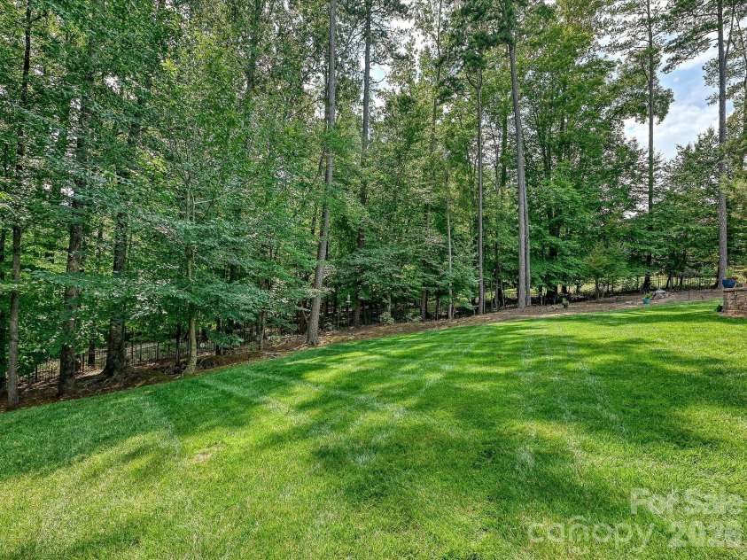 9311 Scorpio Lane, Mint Hill, NC 28227.  MLS# CAR4418915, YatesRealty ID 28169. Backyard