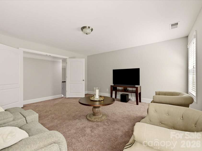 9311 Scorpio Lane, Mint Hill, NC 28227.  MLS# CAR4418915, YatesRealty ID 28169. Media Room