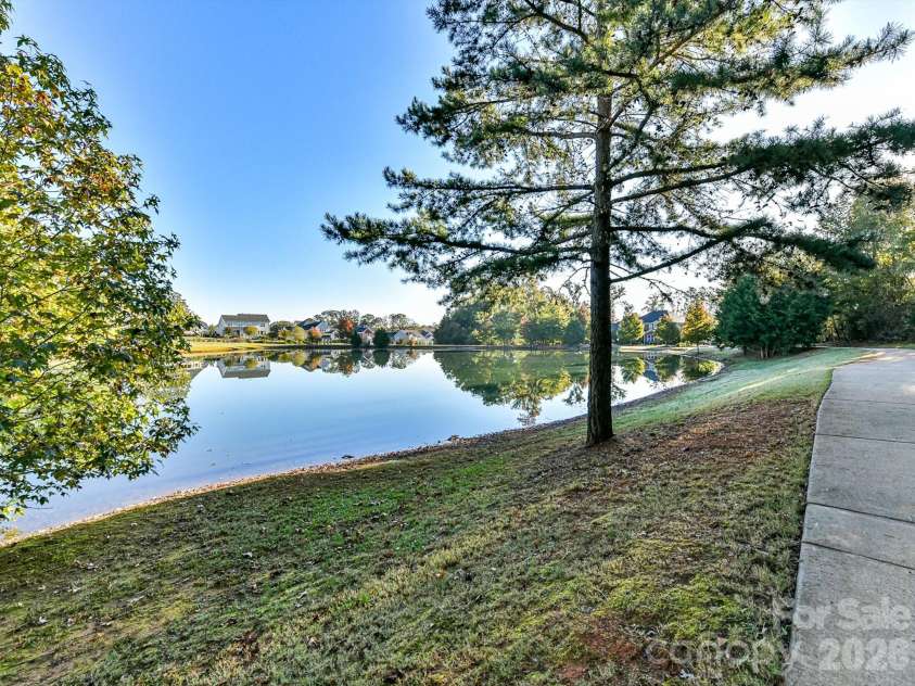9311 Scorpio Lane, Mint Hill, NC 28227.  MLS# CAR4418915, YatesRealty ID 28169. Pond