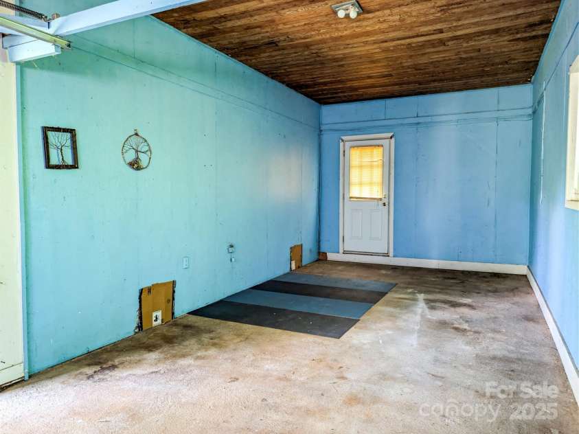 59 Poteat Street, Fletcher, NC 28732.  MLS# CAR4277892, YatesRealty ID 28173. 2nd garage upstairs.