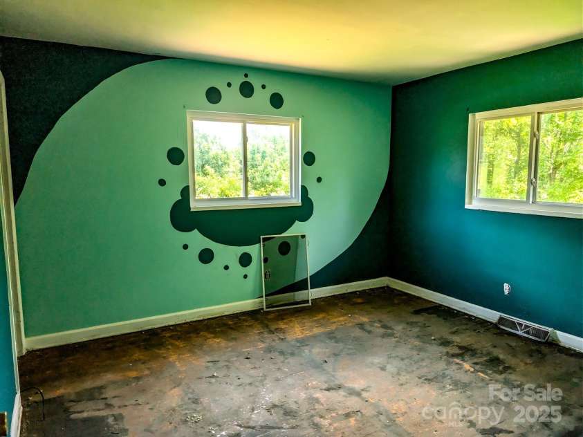 59 Poteat Street, Fletcher, NC 28732.  MLS# CAR4277892, YatesRealty ID 28173. Creative bedroom #1. Fairy motif.
