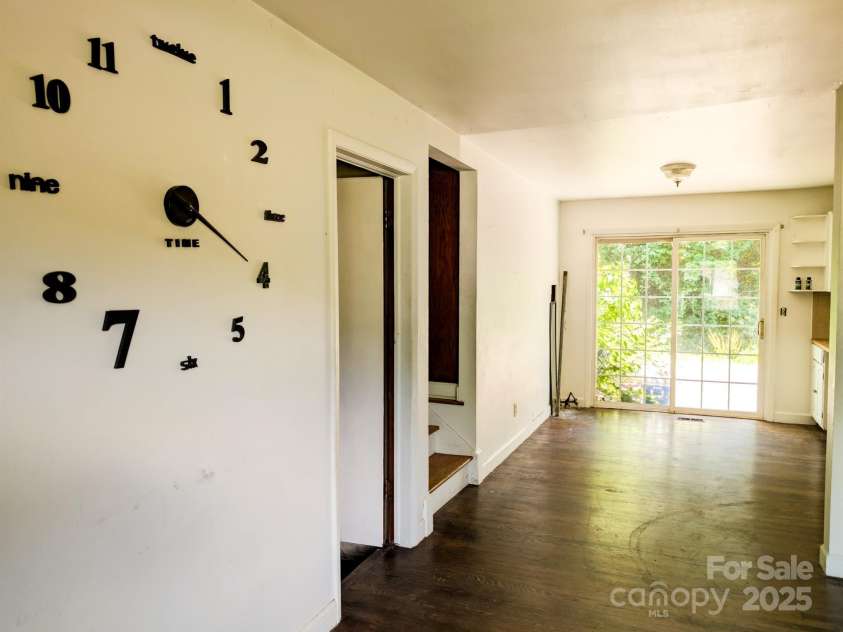59 Poteat Street, Fletcher, NC 28732.  MLS# CAR4277892, YatesRealty ID 28173. Decent floors in the main living area.