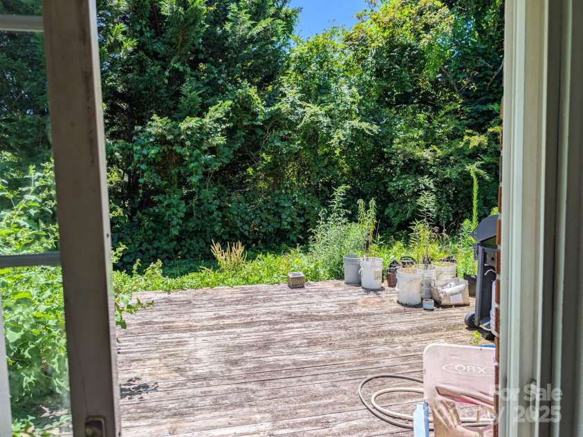 59 Poteat Street, Fletcher, NC 28732.  MLS# CAR4277892, YatesRealty ID 28173. The back deck.
