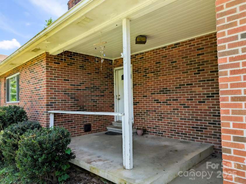 59 Poteat Street, Fletcher, NC 28732.  MLS# CAR4277892, YatesRealty ID 28173. The front porch.