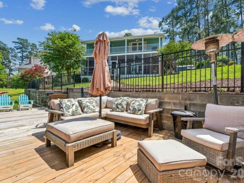 49571 Blackberry Road, Norwood, NC 28128.  MLS# CAR4380046, YatesRealty ID 28176. Deck at waterfront