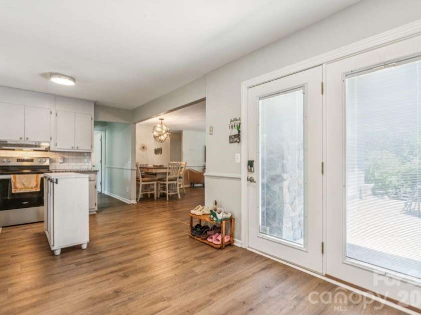 49571 Blackberry Road, Norwood, NC 28128.  MLS# CAR4380046, YatesRealty ID 28176. Front door into kitchen