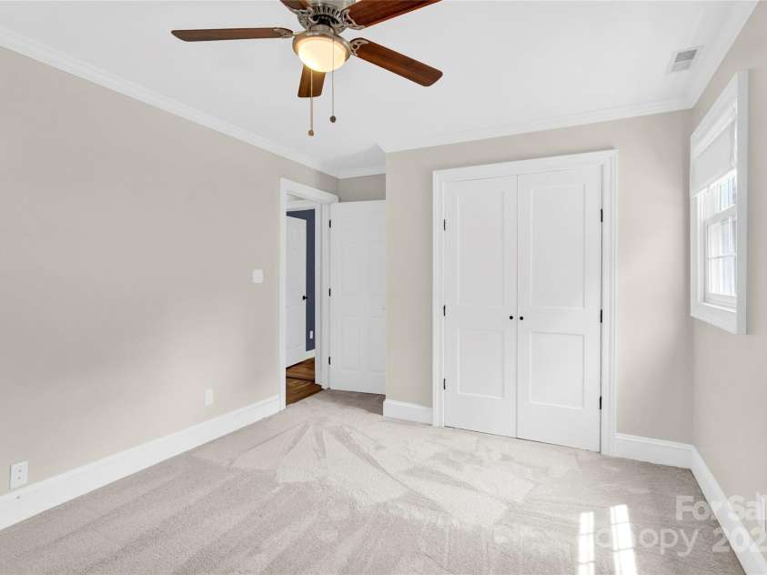 832 Kemp Road, Mooresville, NC 28117.  MLS# CAR4264266, YatesRealty ID 28181. Bedroom #3 view of closet from back windows.