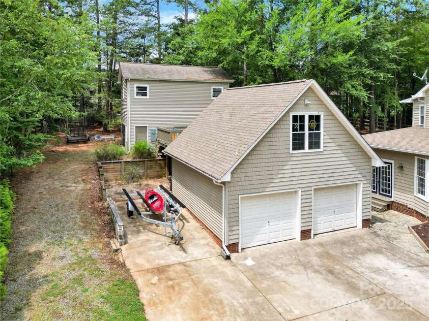 832 Kemp Road, Mooresville, NC 28117.  MLS# CAR4264266, YatesRealty ID 28181. Conrete was cleaned after photos were taken.