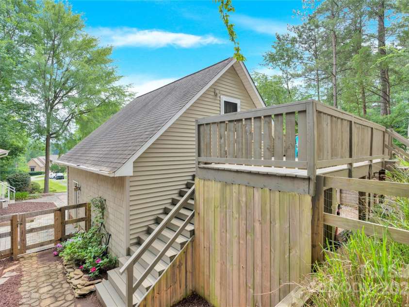 832 Kemp Road, Mooresville, NC 28117.  MLS# CAR4264266, YatesRealty ID 28181. Garage and Upper Deck leading to the FROG