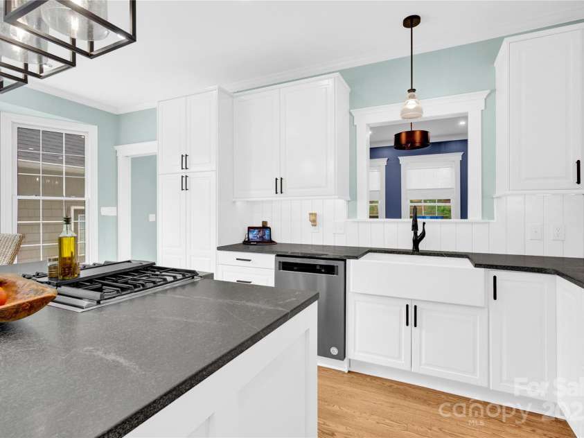 832 Kemp Road, Mooresville, NC 28117.  MLS# CAR4264266, YatesRealty ID 28181. Kitchen view from dining room.