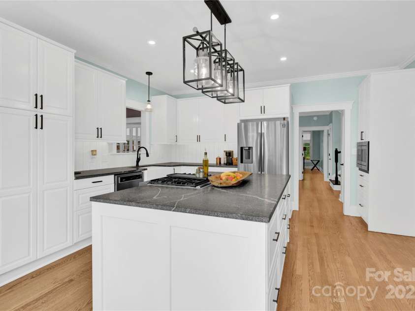 832 Kemp Road, Mooresville, NC 28117.  MLS# CAR4264266, YatesRealty ID 28181. Kitchen with new light fixture.