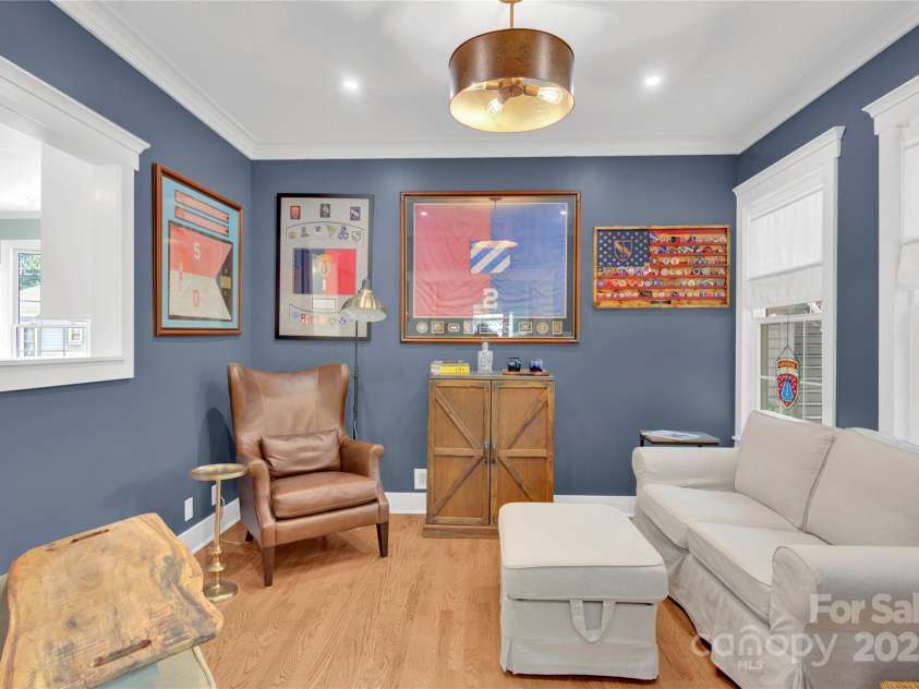 832 Kemp Road, Mooresville, NC 28117.  MLS# CAR4264266, YatesRealty ID 28181. Library just off of living room with pass through to kitchen.