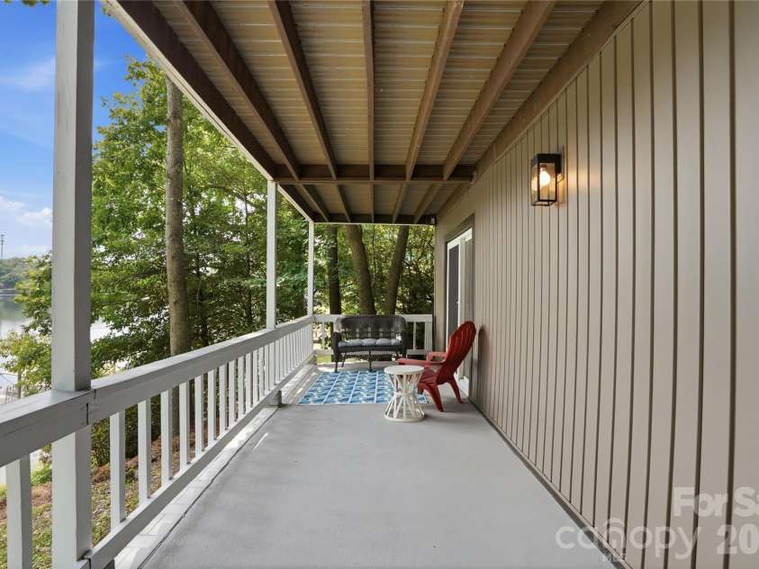 1113 Palmyra Drive, Tega Cay, SC 29708.  MLS# CAR4379735, YatesRealty ID 28182. Covered patio