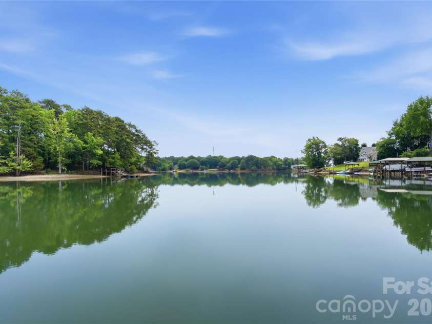 1113 Palmyra Drive, Tega Cay, SC 29708.  MLS# CAR4379735, YatesRealty ID 28182. Offering glorious lake views