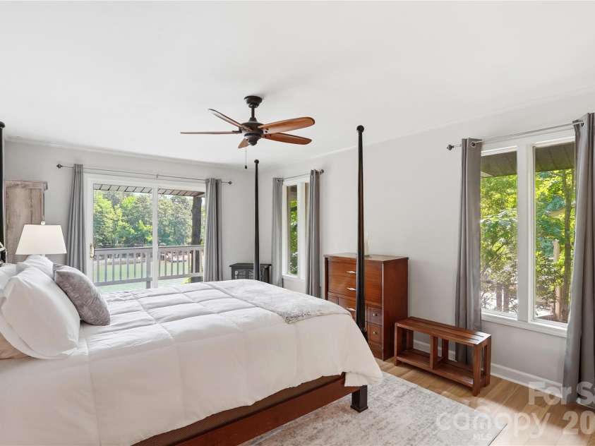 1113 Palmyra Drive, Tega Cay, SC 29708.  MLS# CAR4379735, YatesRealty ID 28182. Primary bedroom with glorious lake views