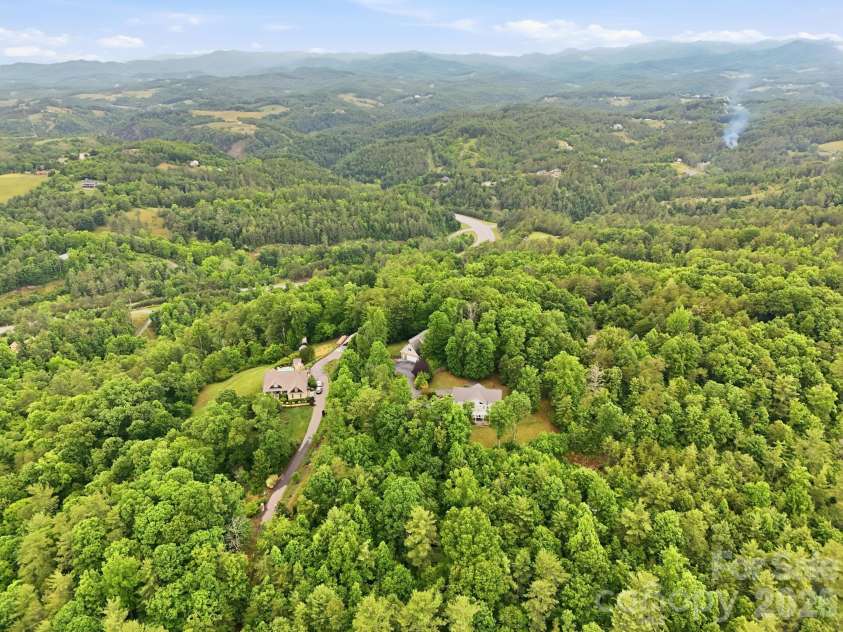 65 Buckle Ridge, Weaverville, NC 28787.  MLS# CAR4383758, YatesRealty ID 28184. Beautiful greenery.