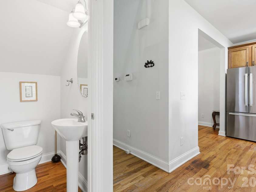 65 Buckle Ridge, Weaverville, NC 28787.  MLS# CAR4383758, YatesRealty ID 28184. Downstairs half bath.