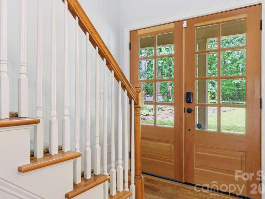 65 Buckle Ridge, Weaverville, NC 28787.  MLS# CAR4383758, YatesRealty ID 28184. Front door/staircase.
