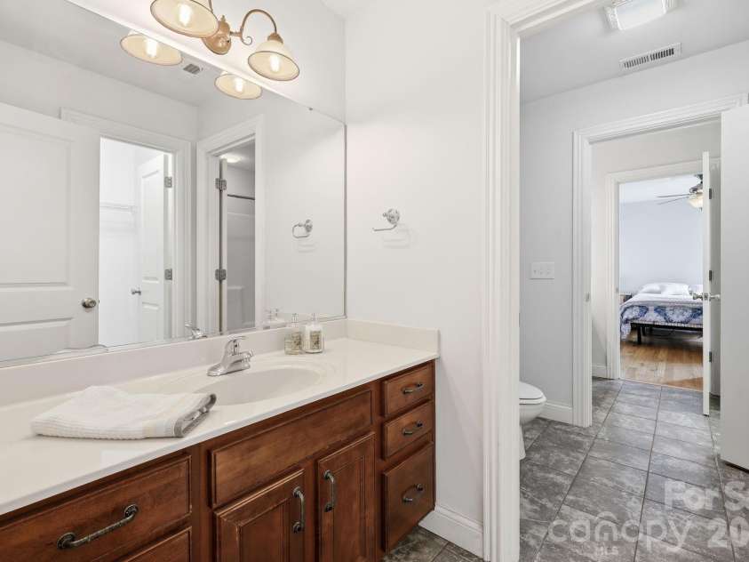 65 Buckle Ridge, Weaverville, NC 28787.  MLS# CAR4383758, YatesRealty ID 28184. Jack and Jill bathroom.