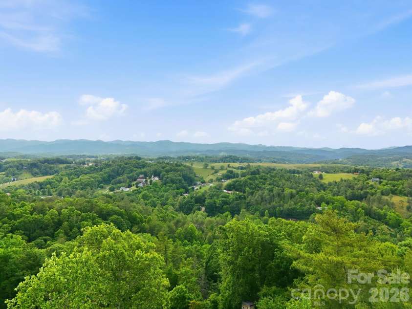 65 Buckle Ridge, Weaverville, NC 28787.  MLS# CAR4383758, YatesRealty ID 28184. Long range mountain views.
