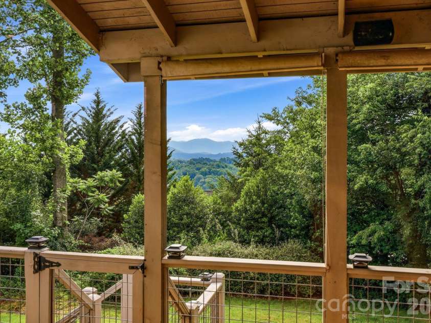 65 Buckle Ridge, Weaverville, NC 28787.  MLS# CAR4383758, YatesRealty ID 28184. Mountain views from the deck.