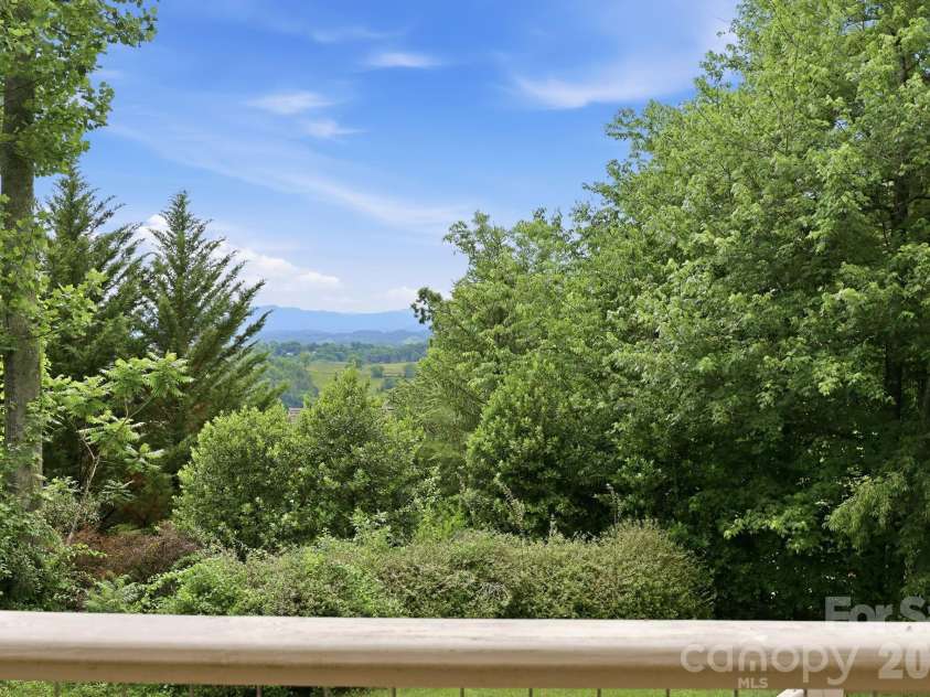 65 Buckle Ridge, Weaverville, NC 28787.  MLS# CAR4383758, YatesRealty ID 28184. Mountain views from the  deck.