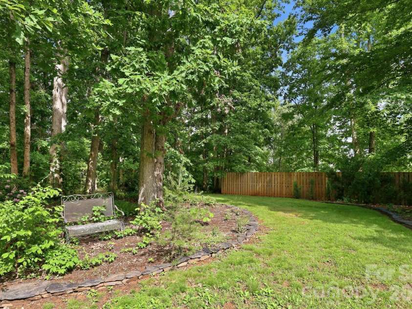 65 Buckle Ridge, Weaverville, NC 28787.  MLS# CAR4383758, YatesRealty ID 28184. Serene front yard.