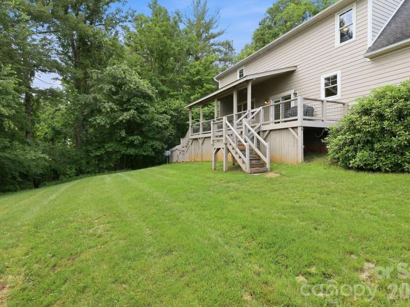 65 Buckle Ridge, Weaverville, NC 28787.  MLS# CAR4383758, YatesRealty ID 28184. Useable backyard.