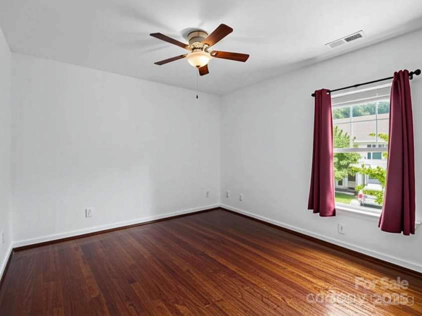 137 Thea Lane, Fletcher, NC 28732.  MLS# CAR4282031, YatesRealty ID 28187. Virtual flooring replacement guest bedroom